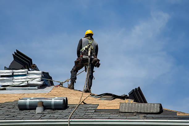 Professional Gutter Installation technician working in Adair, IA